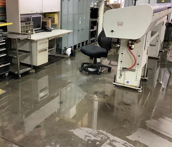 Commercial warehouse after a flood caused by upstairs bathroom leak 