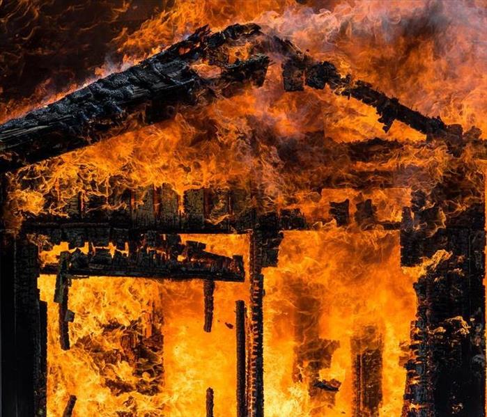 A house frame burning