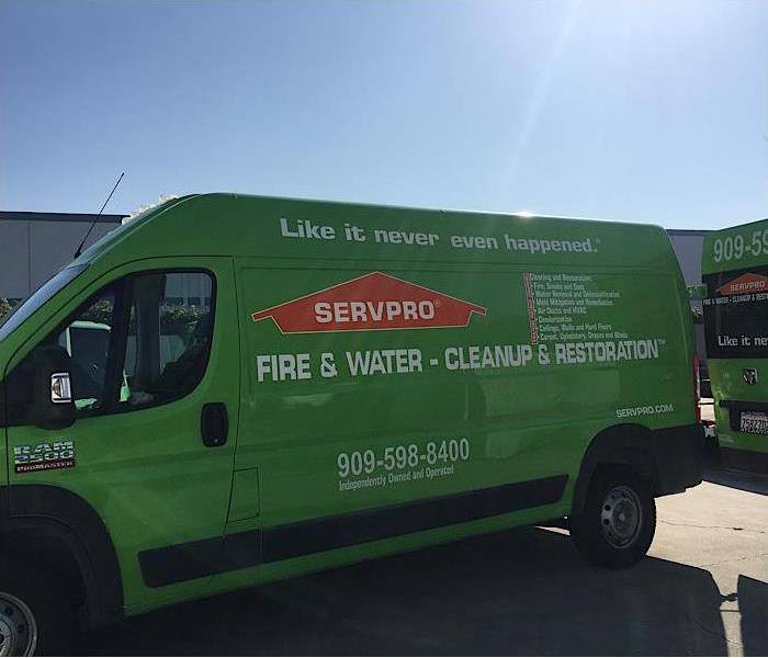 green van with SERVPRO logo and our contact number