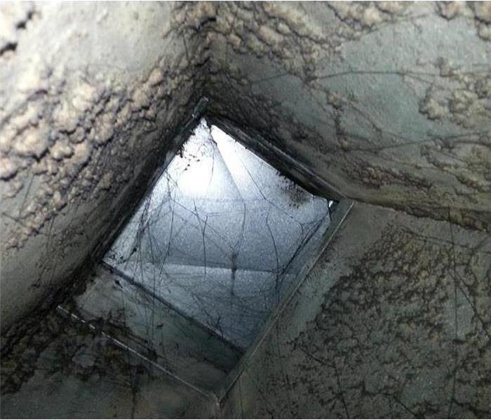 Dust build up inside air ducts.