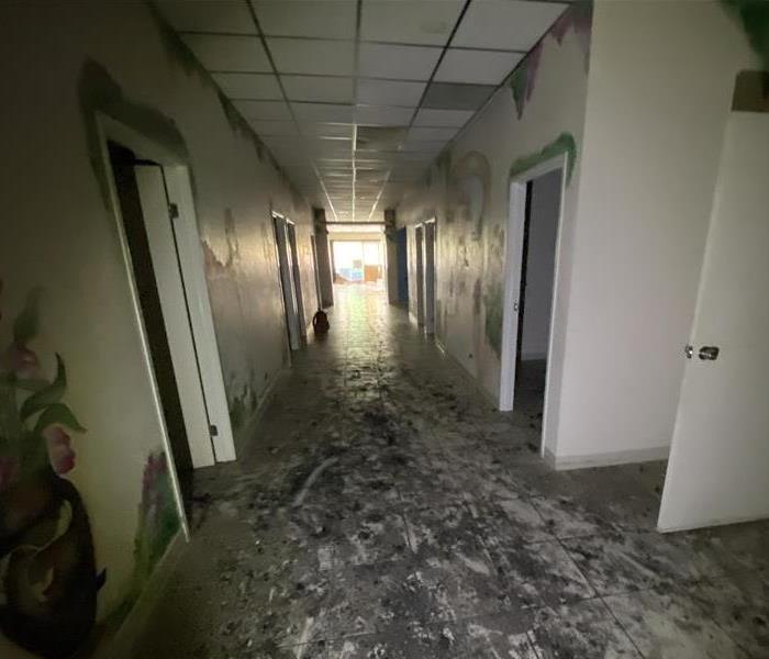 Commercial Building- hallway with soot and smoke damage from fire